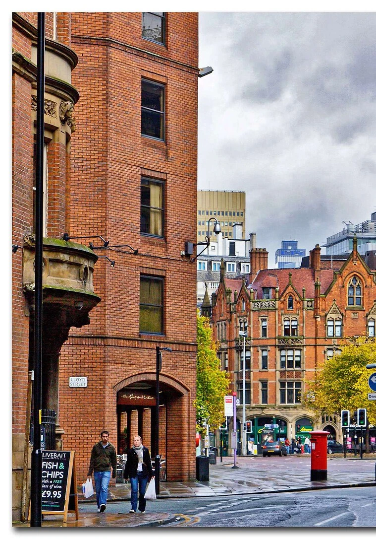 Elite Manchester escorts - red brick street scene in autumn